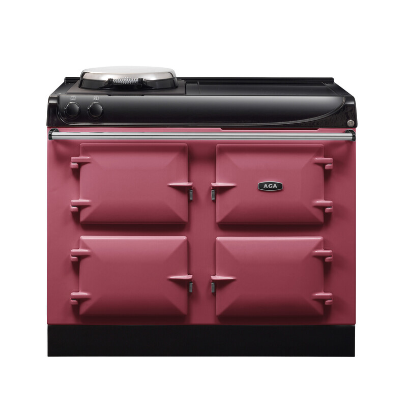 Klassischer AGA Herd in Pink mit vier Backofentüren und schwarzer Kochplatte, freistehend